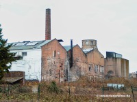 Neusser Hütte, Koppers: Ein in den frühen 2000ern noch existierendes Alt-Gebäude der frühen Neusser Industrie