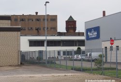 Wasserturm und Halle auf dem Areal des früheren Koppers Werks